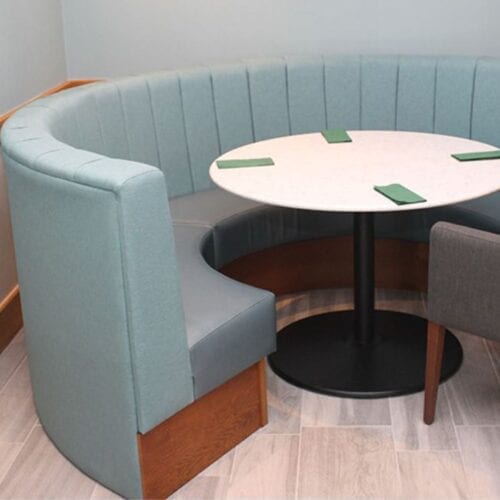 Hotel Restaurant Banquette Circular Banquette seating with table and napkins
