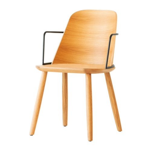 slightly angled front view of dining armchair with metal armrests
