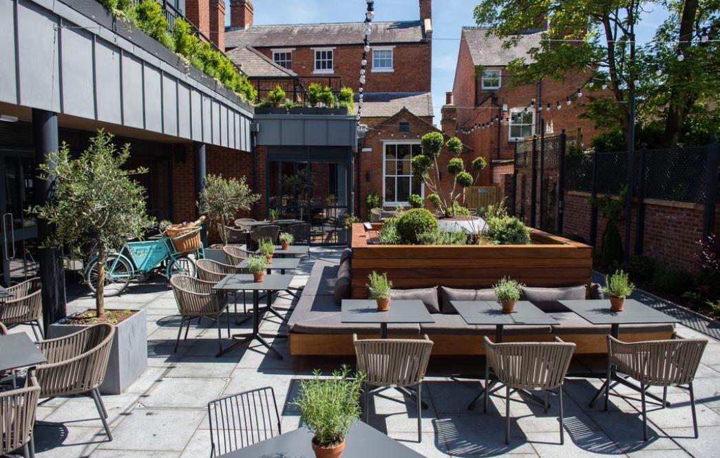 A picture of our outdoor commercial furniture in the sun.